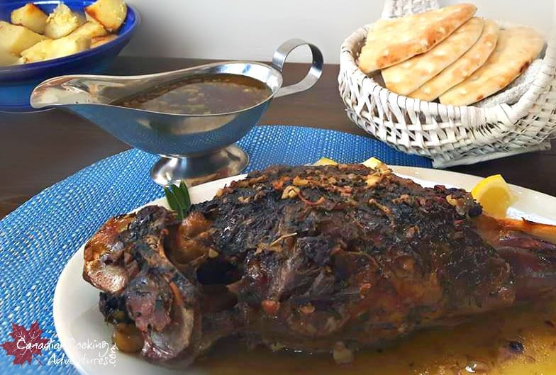 roasted leg of lamb on a serving platter 