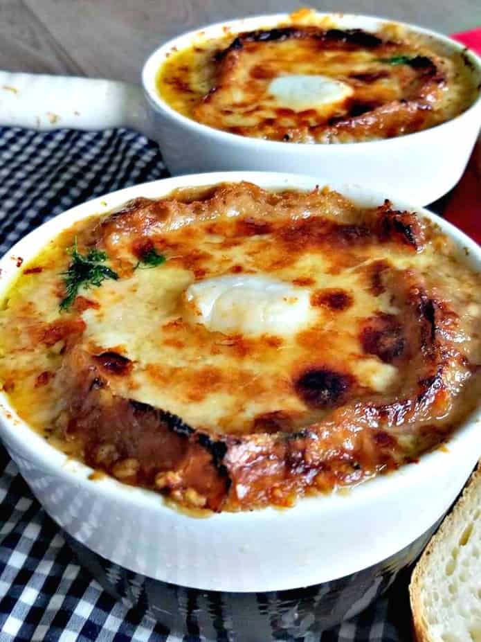 French Onion Soup with Broiled Scallops in two bowls