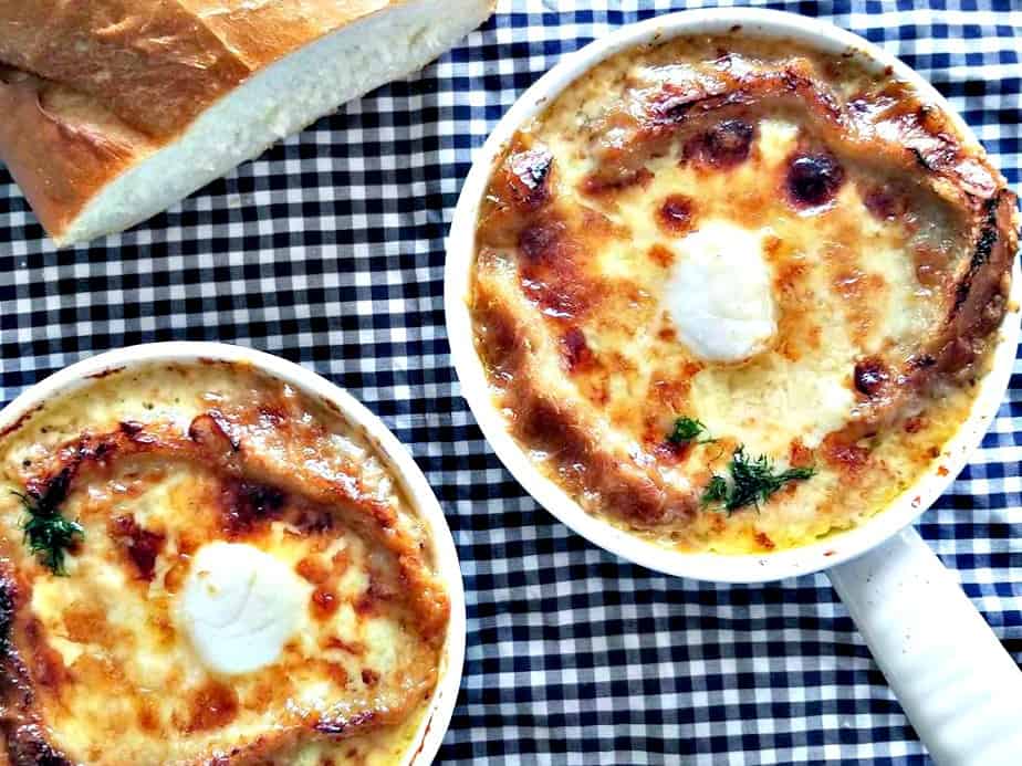 French Onion Soup with Broiled Scallops in two bowls