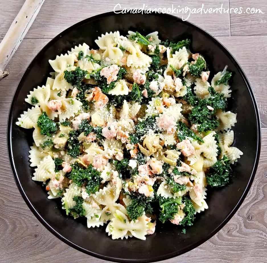 Creamy Bowtie Pasta with Salmon Artichokes and Kale