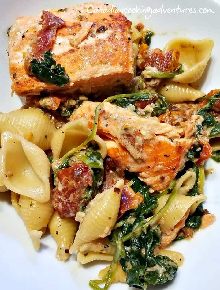 Spicy Tuscan Salmon over pasta 