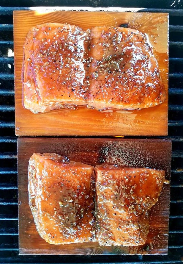 Grilling the cedar plank salmon