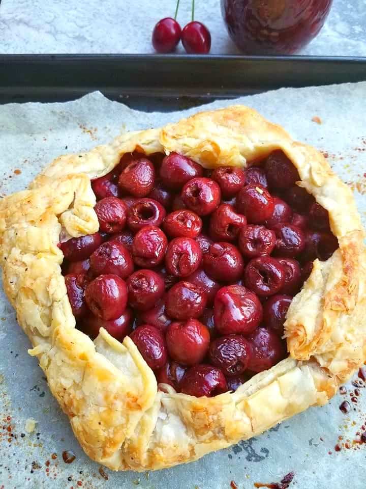 cherry galette with chocolate syrup