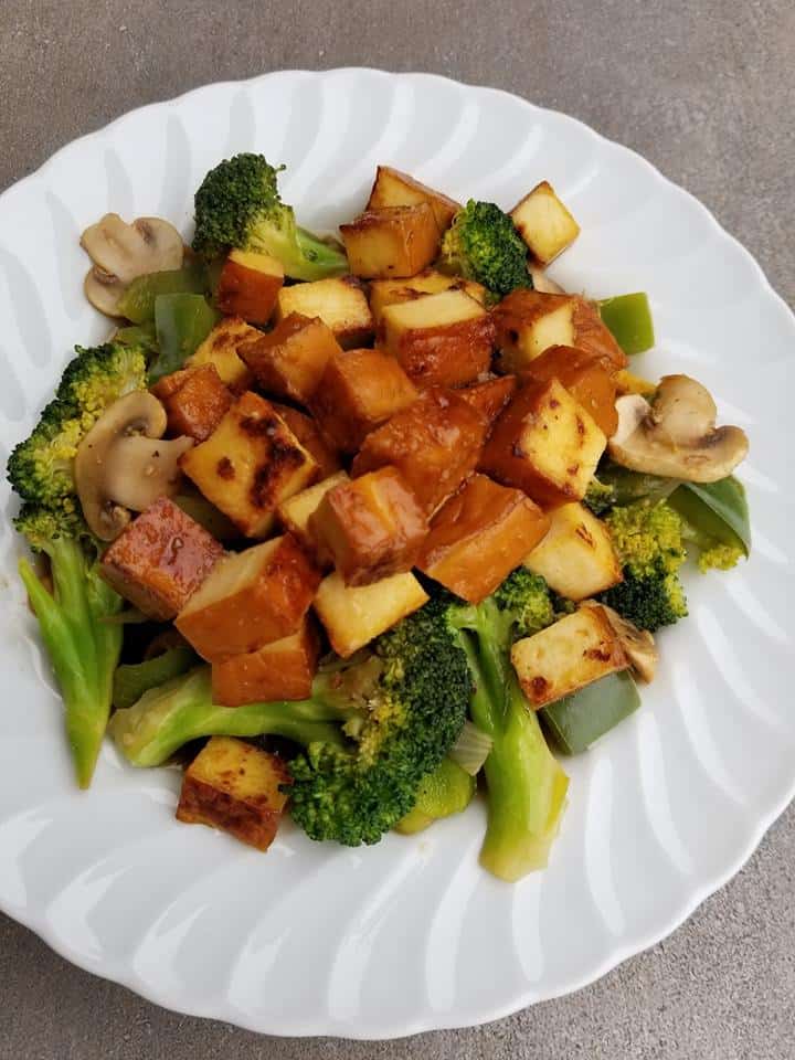 sauteing the Smoked Tofu with vegetables 