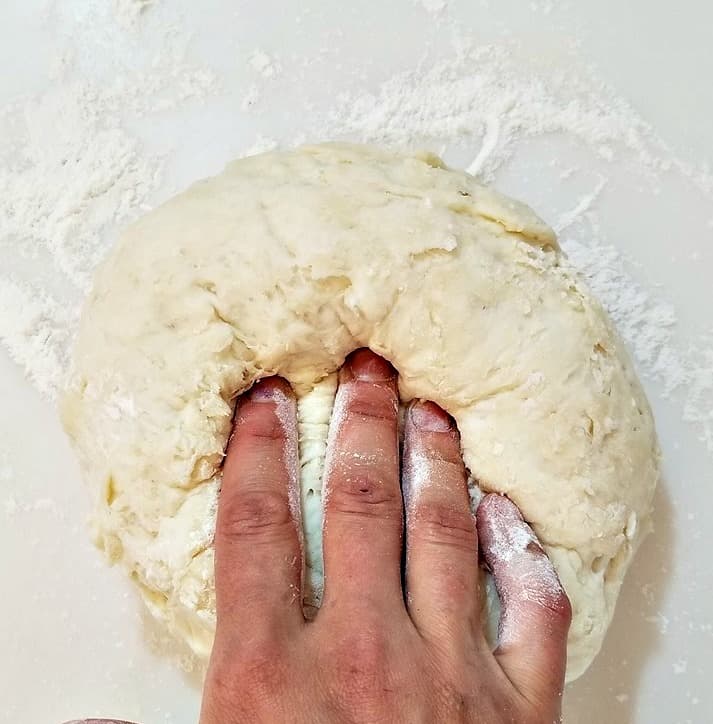 kneading the naan bread with my hand
