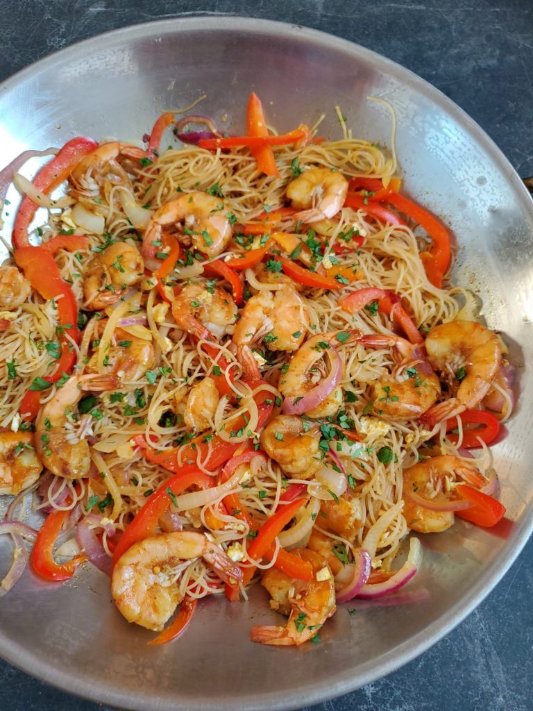 These Singapore Noodles with Shrimp are made with vermicelli rice noodles and are sautéed in a traditional curry sauce. 